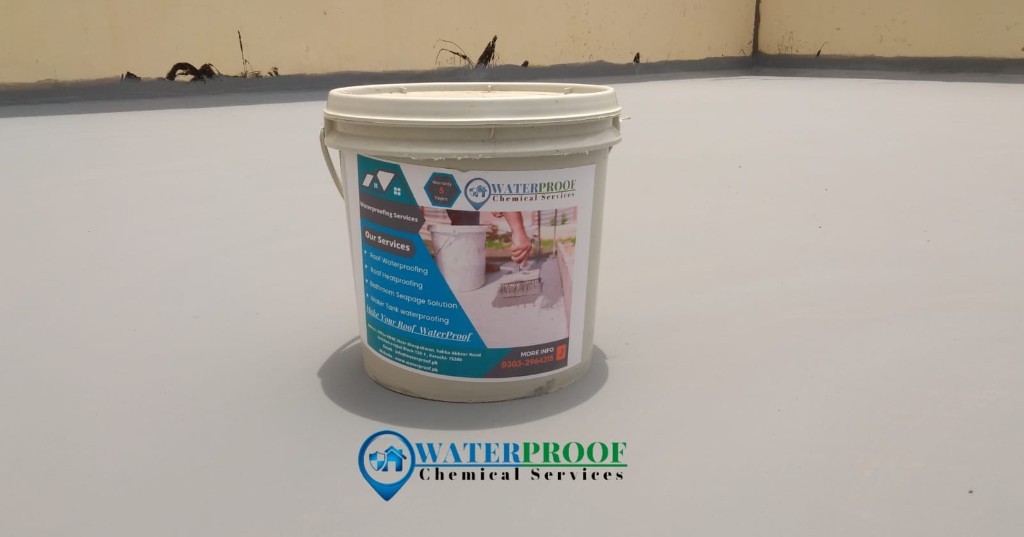 Workers applying white waterproof coating to a corrugated metal roof